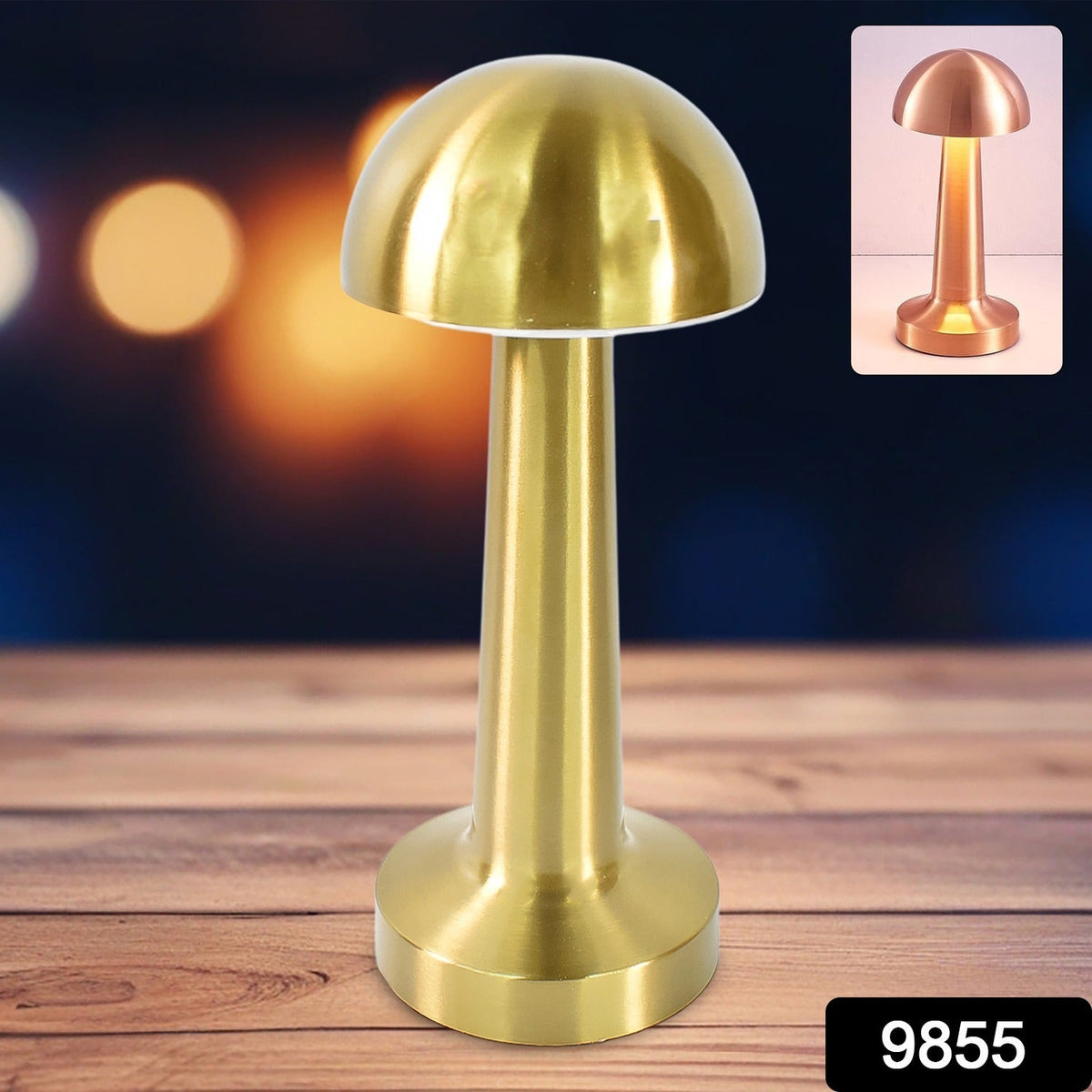 A golden mushroom lamp stands on a wooden surface, with a smaller copper version in the top right corner.
