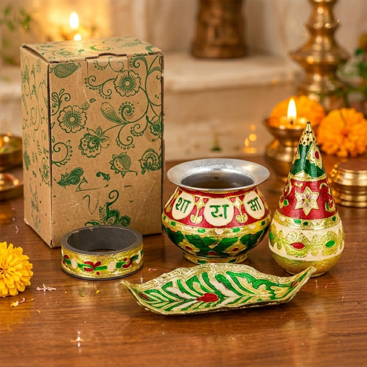 A four-piece kalash set is displayed next to a patterned cardboard box on a wooden surface.