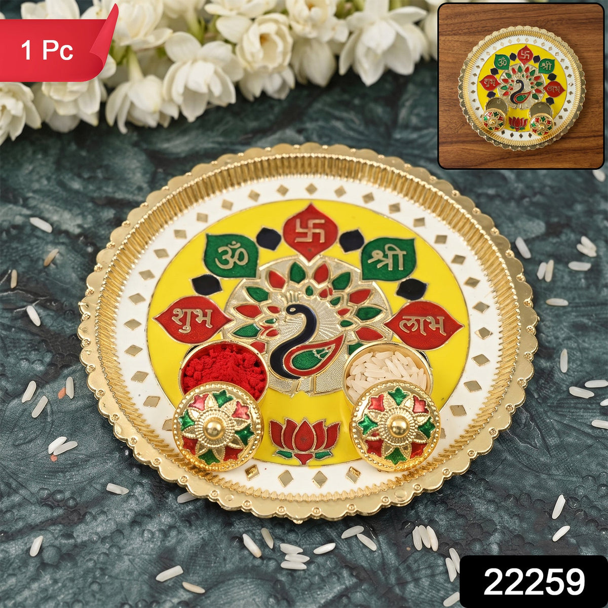 A golden pooja thali with a peacock design, two small bowls, and jasmine flowers in the background.